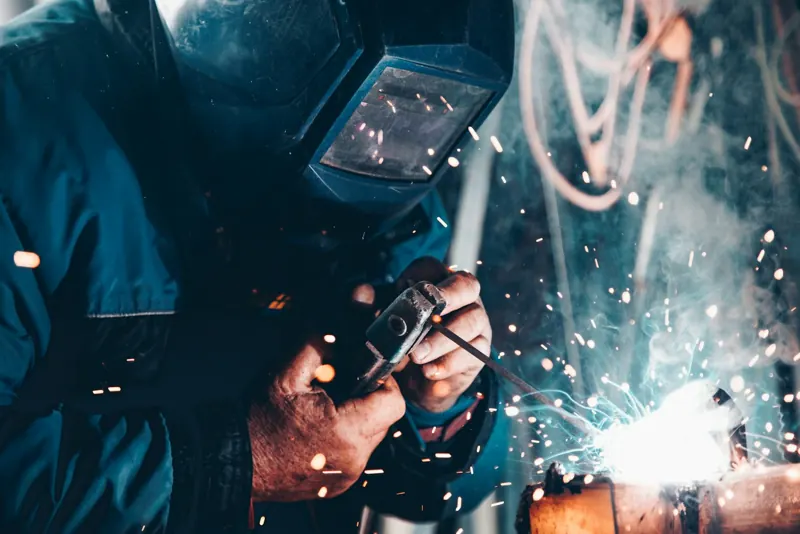 Welder working on a steel structure
